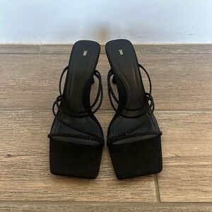 Zara women’s black heel with rhinestone straps.

Size: women’s 10 / 42